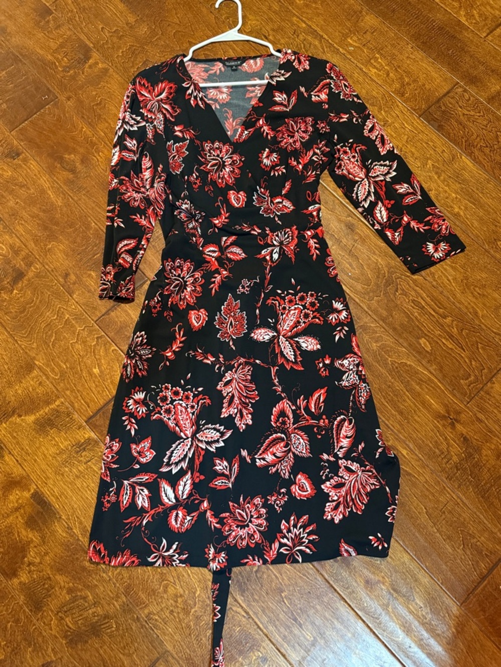 Black Floral Wrap Dress with Red Accents